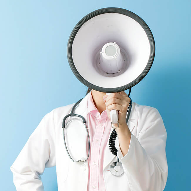 Medical doctor with bullhorn